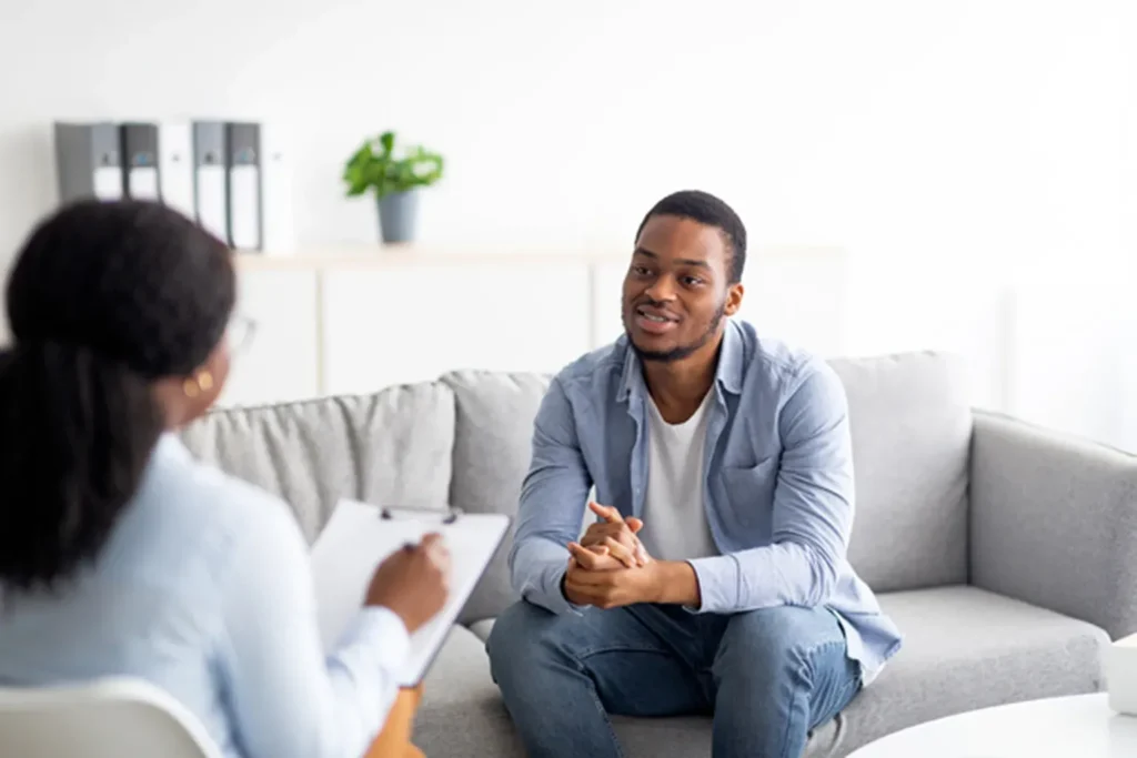 Medical professional and patient discussing psychiatric treatment options